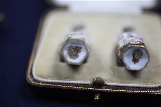A pair of Royal Worcester miniature hexagonal scale blue jars and covers, c.1910, height 3.5cm, in a fitted case